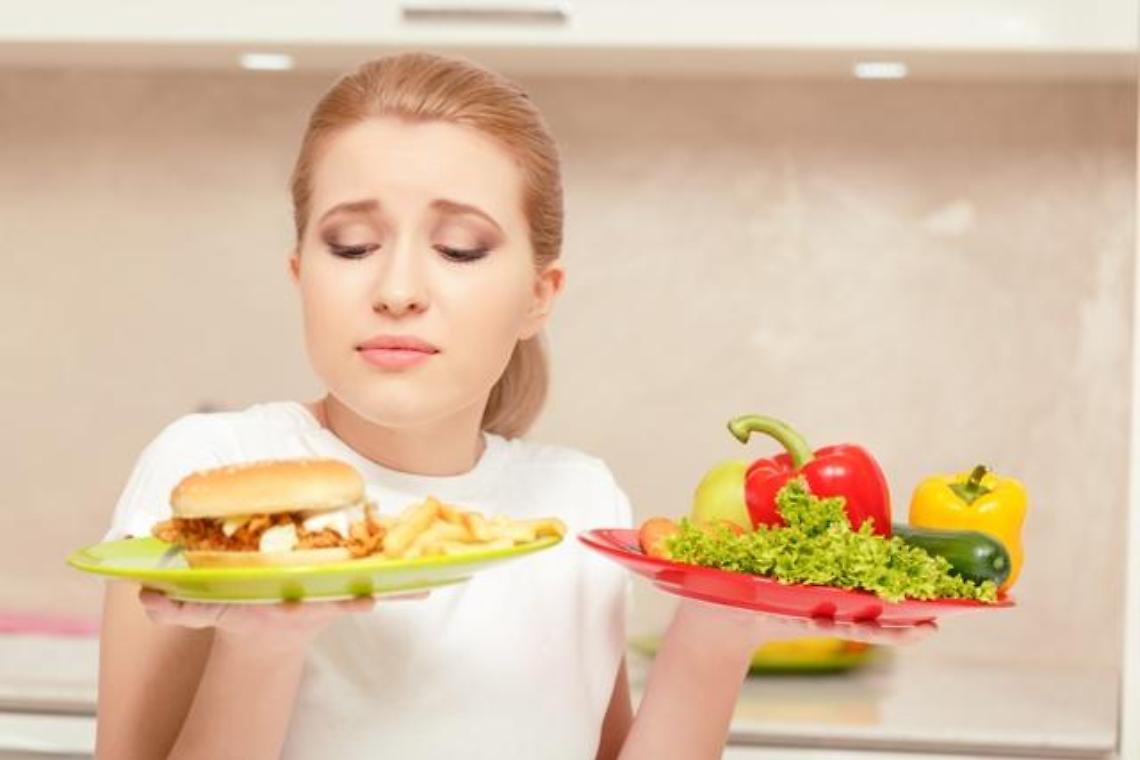 Young woman choosing lunch