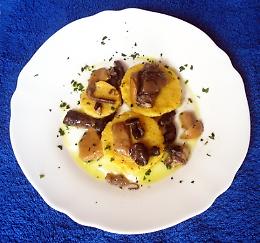 Medaglioni alla salsa di funghi