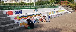 Murales Olmo: la street art per abbellire gli spazi e creare momenti di condivisione