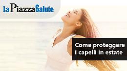 Come proteggere i capelli in estate
