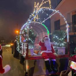Babbo Natale in moto e in slitta