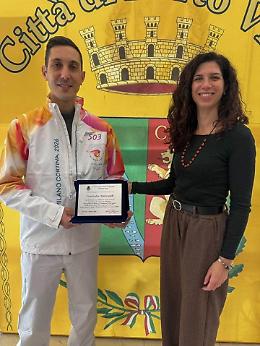 La fiamma olimpica corre con due tedofori di Porto Viro